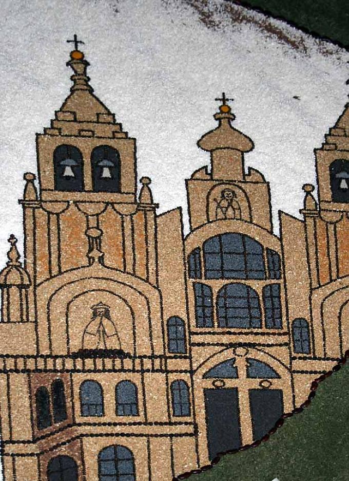 Bildteppich aus Samen mit Darstellung der Wallfahrtskirche in Santiago de Compostella.