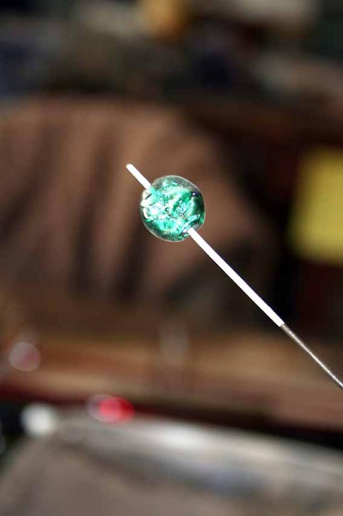 Fertige Glasperle Drehen der Perlen