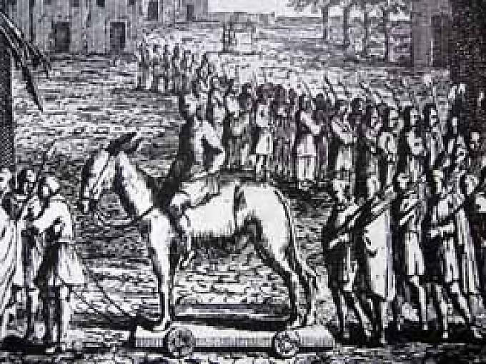 Hültzin Esel auf einem Wägelin