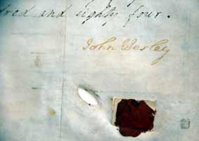 An der Wand hängt das Original des Ordinationszertifikats des Predigers Thomas Coke. An der Wand hängt das Original des Ordinationszertifikats des Predigers Thomas Coke.